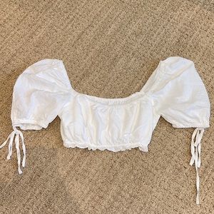 White crop top with puffy tie sleeves